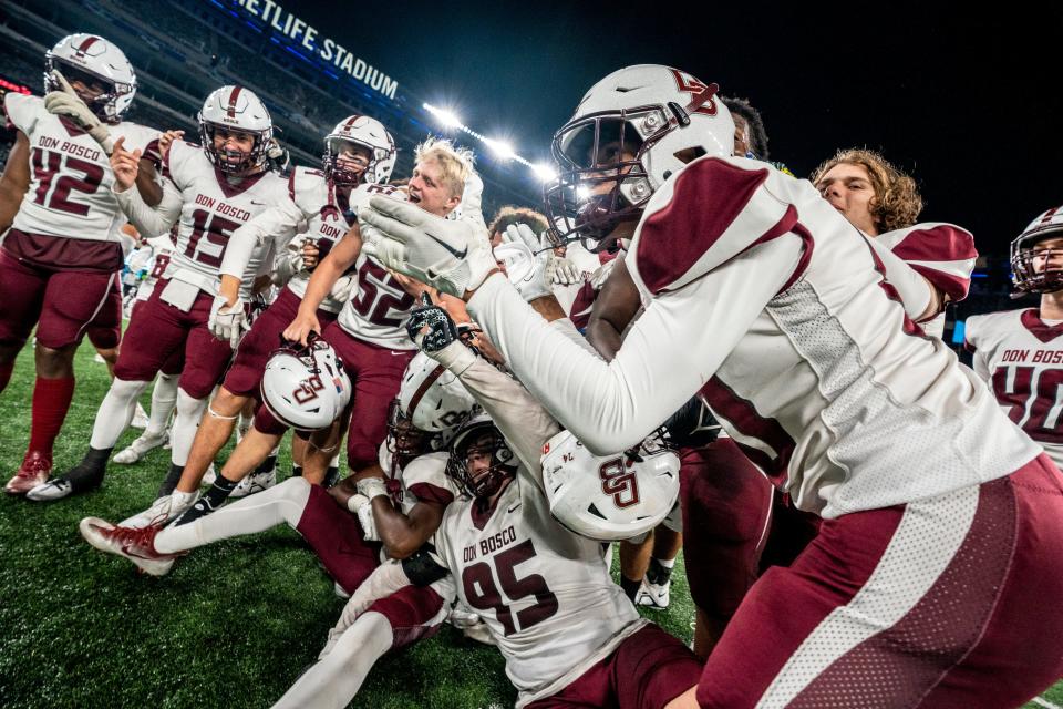 Don Bosco plays St. Peter's Prep in a football game at MetLife Stadium East Rutherford, NJ on Friday September 30, 2022. Don Bosco celebrates their 35-26 win.