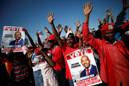 Supporters of Nelson Chamisa's opposition Movement for Democratic Change (MDC) party attend the final election rally in Harare, Zimbabwe, July 28, 2018. REUTERS/Mike Hutchings