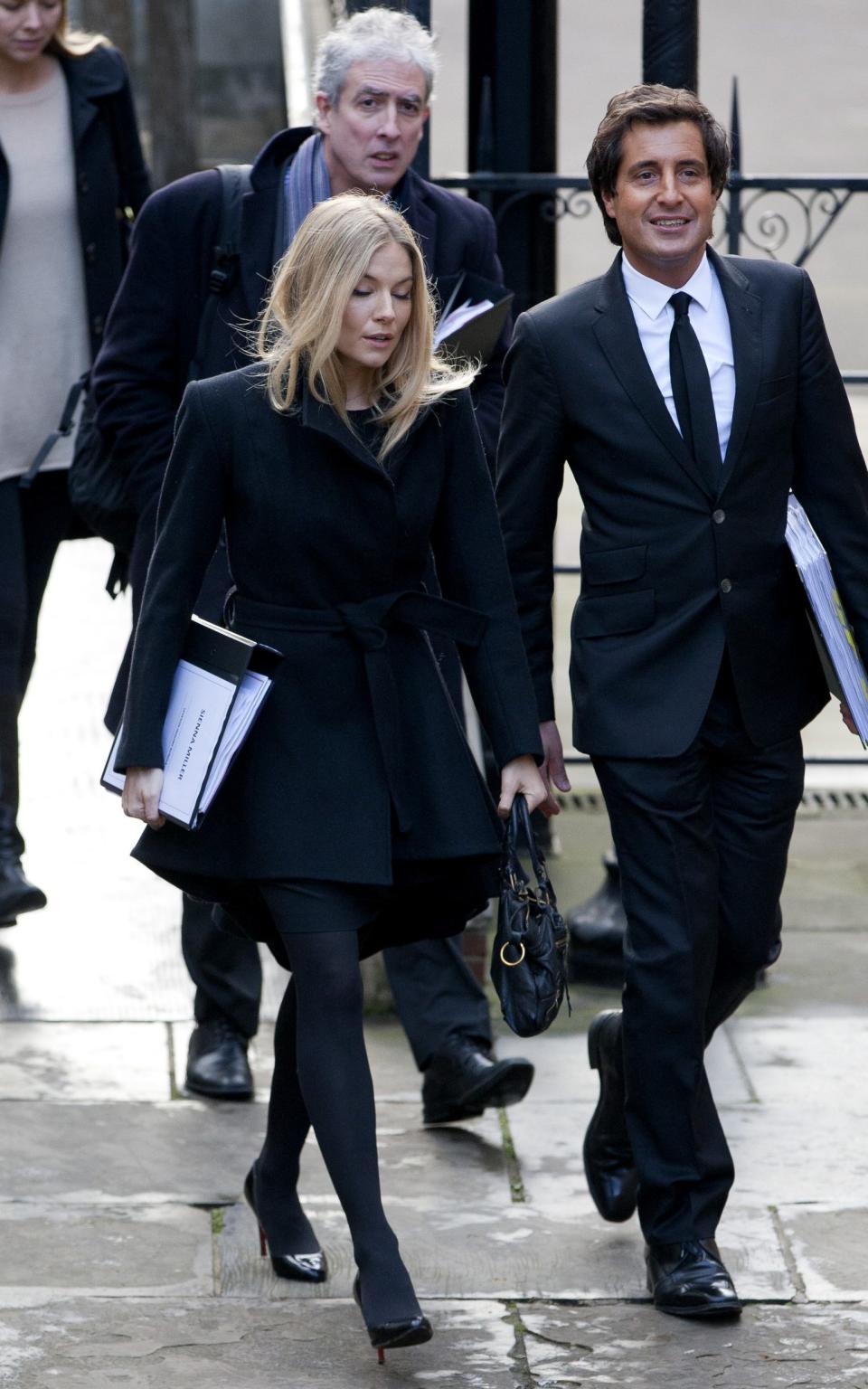 Sienna Miller arrives at the Leveson Enquiry