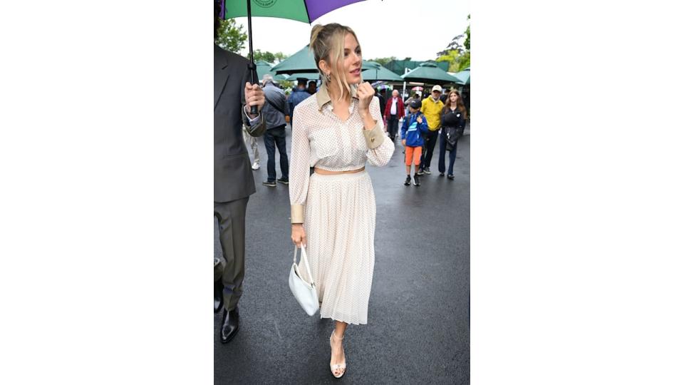 Sienna wore the chicest crop top and skirt set from Prada