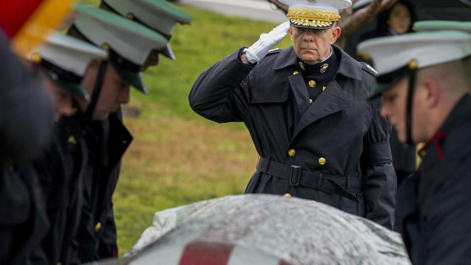 Commandant of the Marine Corps, Gen. David H. Berger salutes the casket of retired 28th Commandant of the Marine Corps Gen. Paul X. Kelley on Feb. 13, 2020. (Sgt. Daisha R. Johnson/Marine Corps)