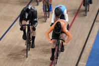 Shanne Braspennincx of Team Netherlands crosses the line to win the gold medal as Ellesse Andrews of Team New Zealand, left, wins silver and Lauriane Genest of Team Canada wins bronze, during the track cycling women's keirin at the 2020 Summer Olympics, Thursday, Aug. 5, 2021, in Izu, Japan. (AP Photo/Christophe Ena)