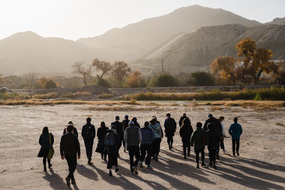 A group of clergy that included Rabbi Miriam Terlinchamp of Temple Sholom in Blue Ash walk along the banks of the Rio Grande bearing witness to migrant passage and the border wall.
