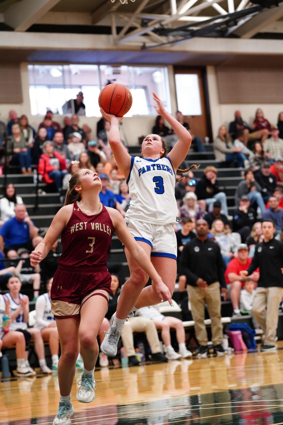 U-Prep’s Aubrey Caudell (3) goes up for 2 points against West Valley’s Tess Hydrick (3) in the third quarter of the Championship game on Saturday at Shasta College.