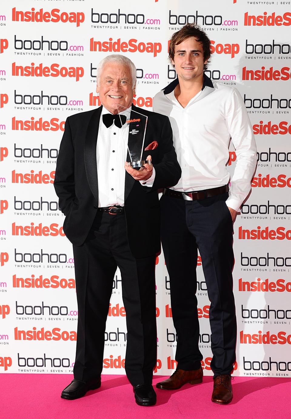 Neighbours cast members Tom Oliver and Chris Milligan with the award for Best Daytime Soap at the 2012 Inside Soap Awards at One Marylebone, London.