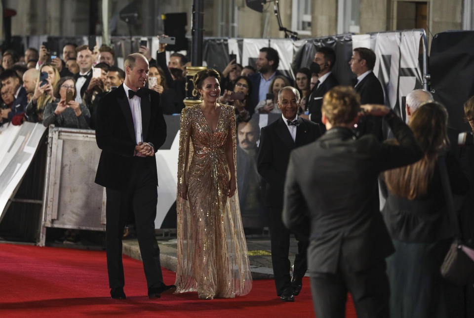 Britain's Prince William, left, and his wife Kate the Duchess of Cambridge arrive for the World premiere of the new film from the James Bond franchise 'No Time To Die', in London Tuesday, Sept. 28, 2021. (Photo by Vianney Le Caer/Invision/AP)