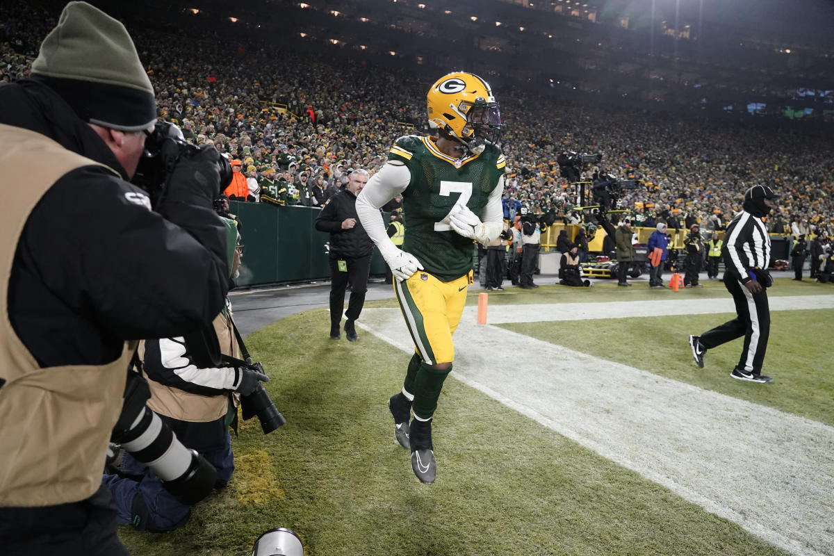 GREEN BAY, WI - JANUARY 08: Green Bay Packers linebacker Quay Walker (7)  celebrates during a game between the Green Bay Packers and the Detroit Lions  at Lambeau Field on January 8