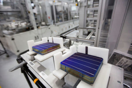 Solar cells on a cart are ready to be loaded in to an automated machine at the SolarWorld solar panel factory in Hillsboro, Oregon, U.S., January 15, 2018. REUTERS/Natalie Behring