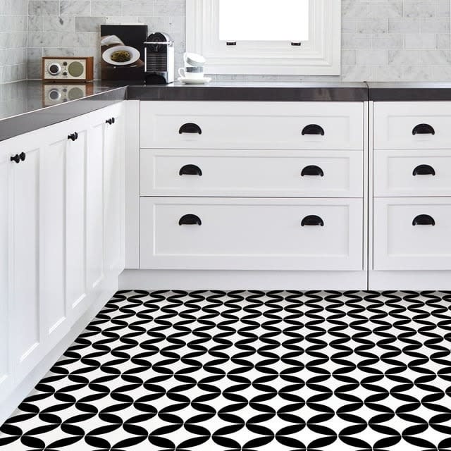 the black and white tile in a kitchen
