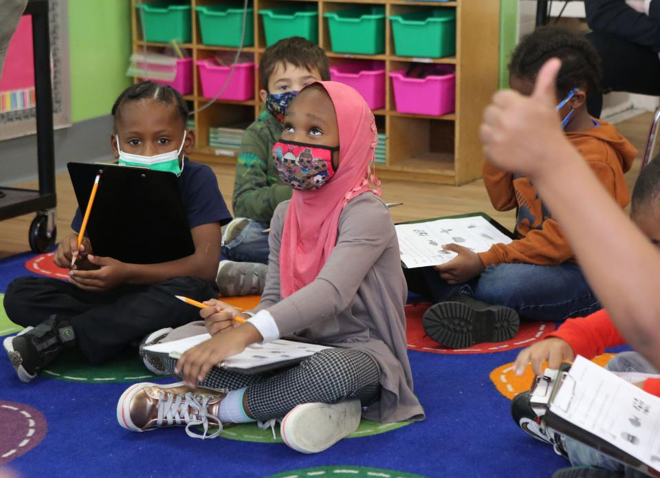 Kindergarten students get instruction time Monday afternoon at East Side Charter School in Wilmington.