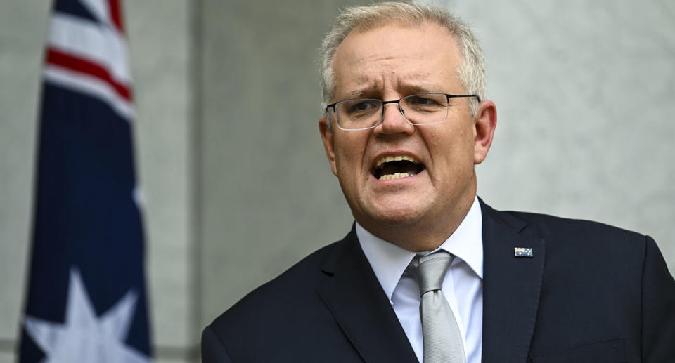 Photo shows Scott Morrison speaking at a press conference.