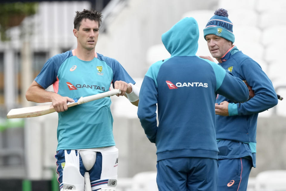 Australia's captain Pat Cummins, left, during a training session at The Oval cricket ground in London, Monday, June 5, 2023. Australia will play India in the World Test Championship 2023 Final at The Oval starting June 7. (AP Photo/Kirsty Wigglesworth)