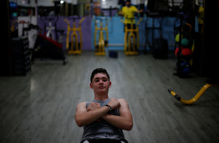 A Palestinian man exercises in a gym in Gaza City. REUTERS/Suhaib Salem