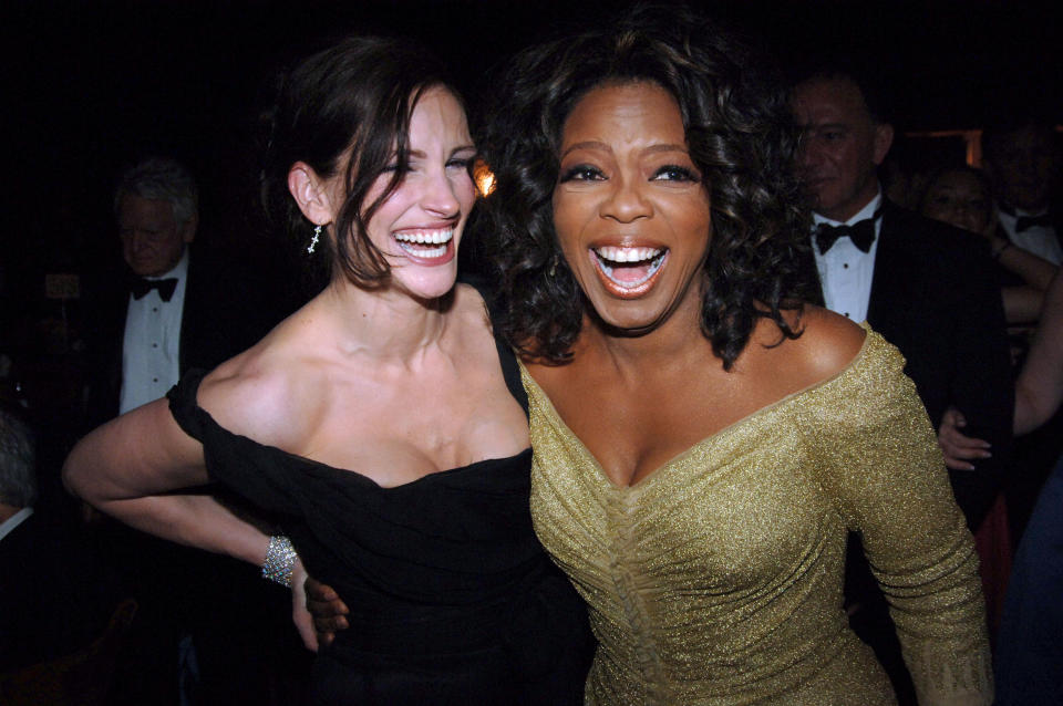 Julia Roberts and Oprah Winfrey make each other smile. (Photo: Jeff Kravitz/FilmMagic, Inc)