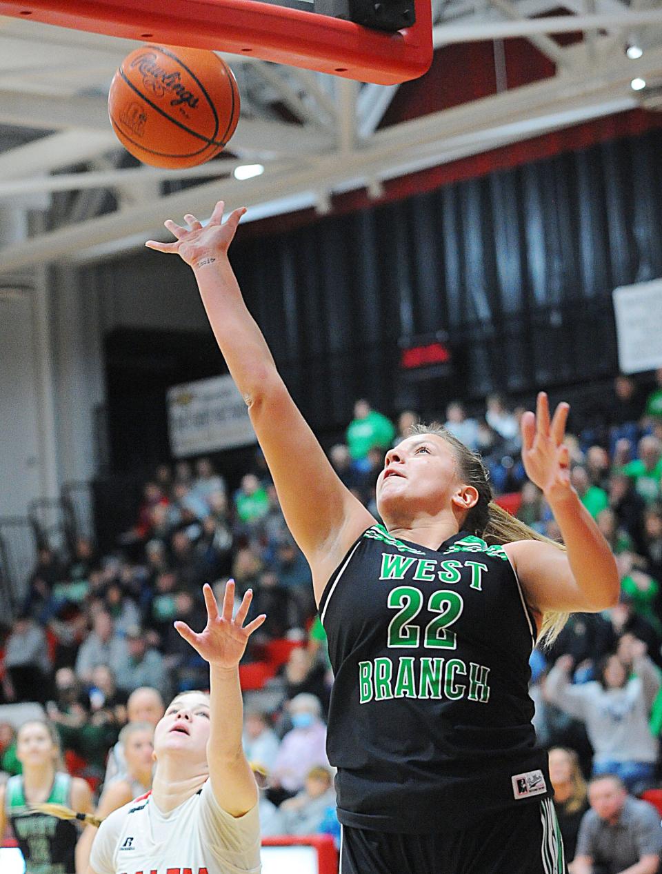 West Branch's Sydney Mercer lays a shot up off the glass in an Eastern Buckeye Conference game against the Quakers Saturday, January 22, 2022 at Salem High School.