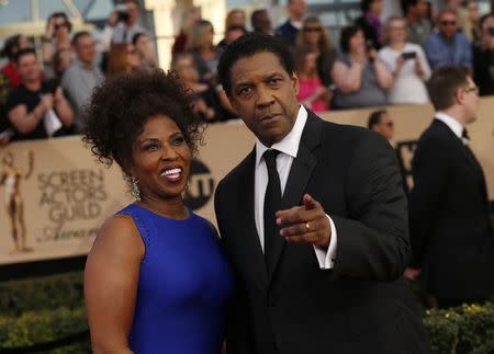 Actor Denzel Washington and wife, Pauletta, arrive at the 23rd Screen Actors Guild Awards in Los Angeles, California, U.S., January 29, 2017. REUTERS/Mario Anzuoni/Files