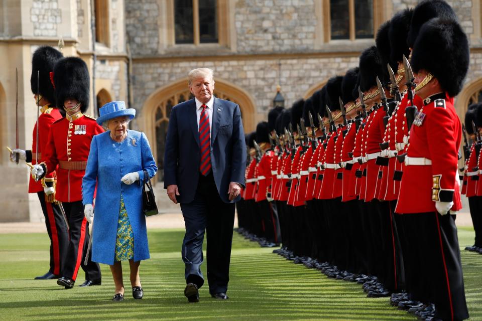 U.S. President Donald Trump with Queen Elizabeth II, inspects the Guard of Honour at Windsor Castle in Windsor, England.