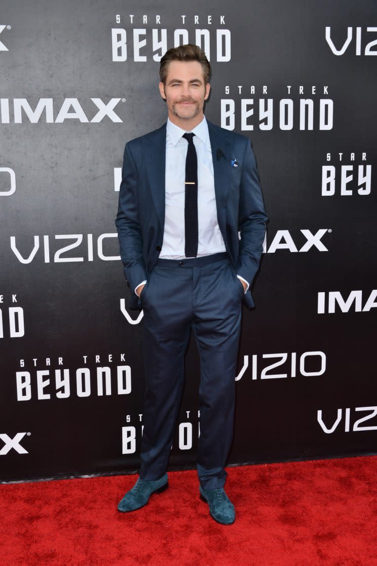 Chris Pine is wearing blue suede shoes. 