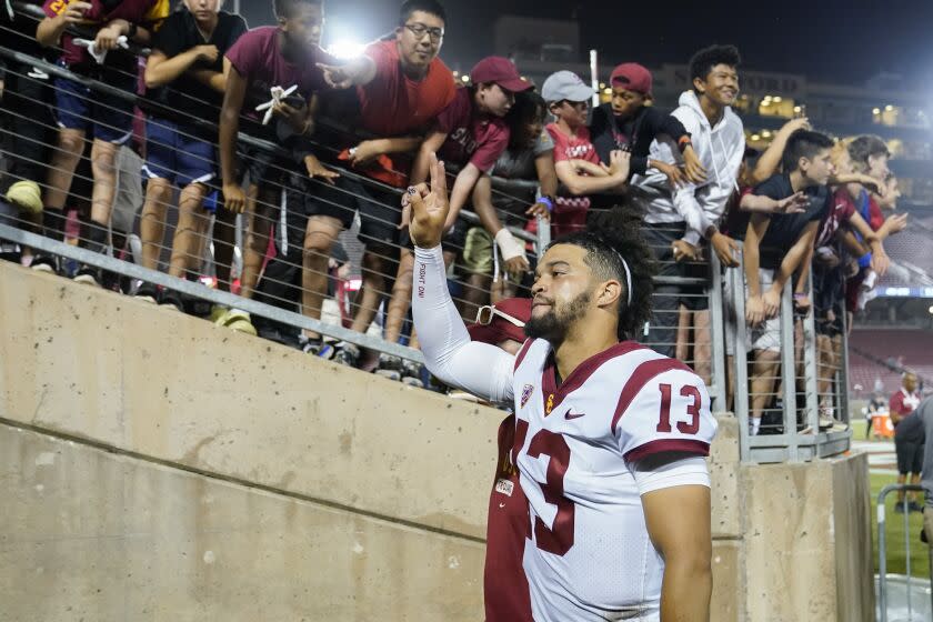 USC quarterback Caleb Williams walks off the field after the Trojans' victory at Stanford on Sept. 10, 2022.