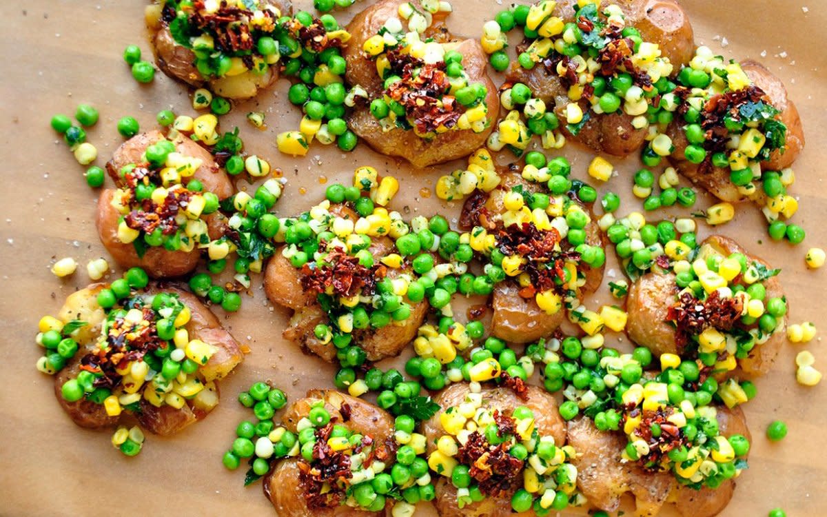 <p>Sanura Weathers</p><p>Bryant Terry's recipe for smashed potatoes, peas and corn with chile-garlic oil is inspired by the flavors of a Kenyan recipe for irio—a seasoned puree of white potatoes, green peas and corn that is occasionally mixed with greens.</p><p><strong>Get the recipe: <a href="https://parade.com/282626/sanuraweathers/a-fresh-remix-of-soul-food-bryant-terrys-smashed-potatoes-peas-and-corn-with-chile-garlic-oil/" rel="nofollow noopener" target="_blank" data-ylk="slk:Smashed Potatoes, Peas and Corn with Chili-Garlic Oil;elm:context_link;itc:0;sec:content-canvas" class="link rapid-noclick-resp">Smashed Potatoes, Peas and Corn with Chili-Garlic Oil</a></strong></p><p><strong>Related: <a href="https://parade.com/243931/lorilange/5-black-eyed-pea-recipes-for-good-luck-in-the-new-year/" rel="nofollow noopener" target="_blank" data-ylk="slk:10 Black-Eyed Pea Recipes To Bring Luck;elm:context_link;itc:0;sec:content-canvas" class="link rapid-noclick-resp">10 Black-Eyed Pea Recipes To Bring Luck</a></strong></p>