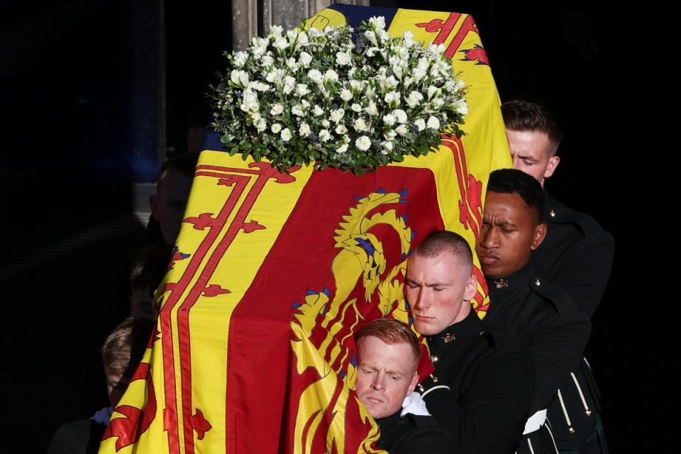 The coffin was topped with white flowers as the Queen lay at St Giles’ Cathedral in Edinburgh (Russell Cheyne/PA) (PA Wire)