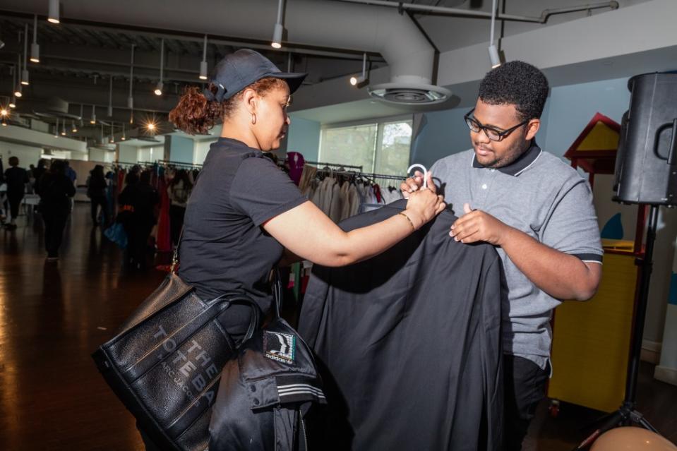 Griselda Ramirez spent the afternoon helping her son, Israel Martinez, find a suit ahead of his senior prom. OLGA GINZBURG FOR THE NEW YORK POST