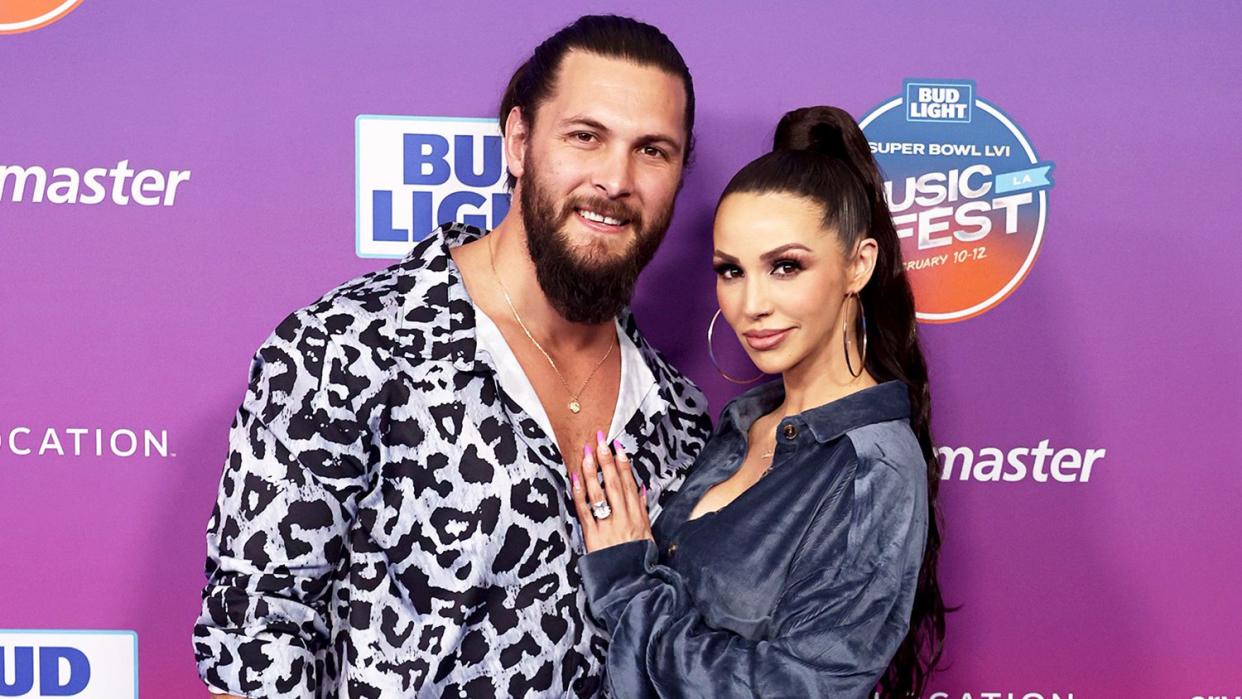 Brock Davies and Scheana Shay attend the 2022 Bud Light Super Bowl Music Fest at Crypto.com Arena on February 12, 2022 in Los Angeles, California.