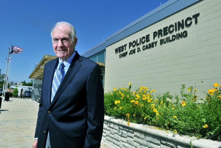 Retired Metro Police Chief Joe Casey stands in front of the West Nashville Police Precinct on Charlotte Pike that is named in his honor May 14, 2013. Casey, who served as police chief for 16 years, said serving the people of Davidson County was one of the most rewarding things of his life.
