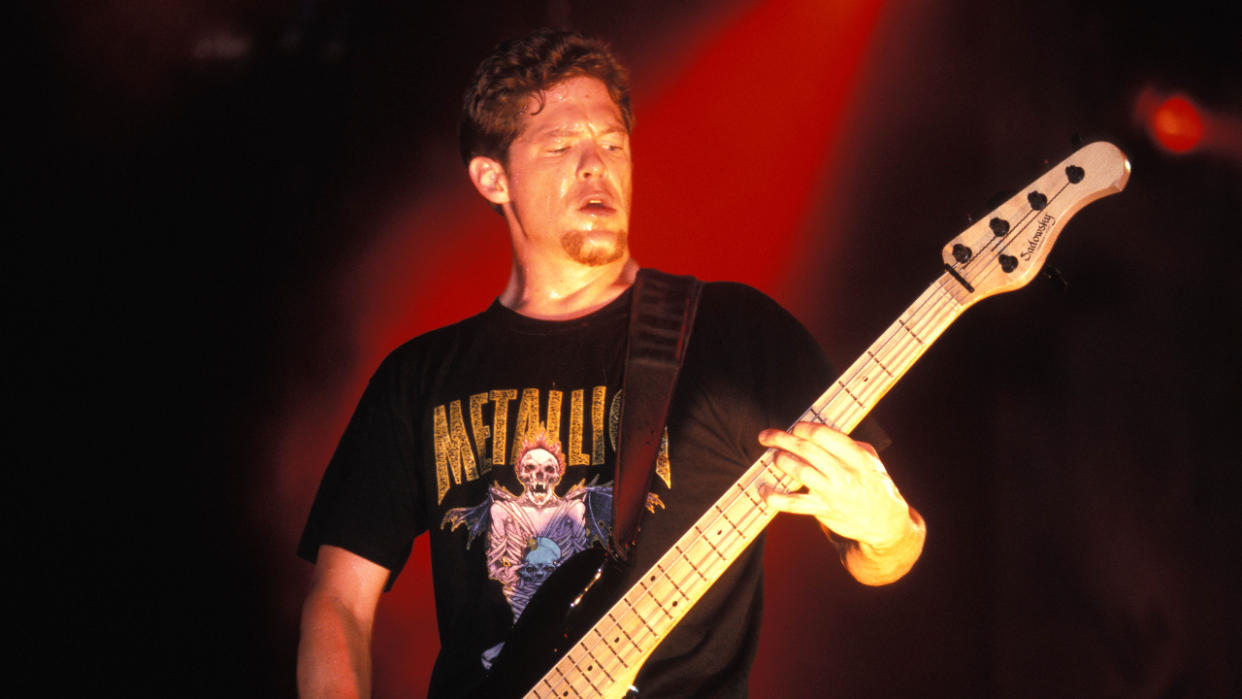  Jason Newsted on stage with Metallica in the 90s. 
