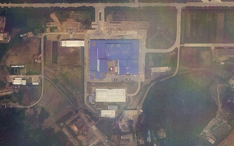 New satellite images show a red truck in a courtyard similar to previous vehicles used to help develop long range missiles