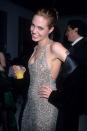 <p>At the 1999 Golden Globes, with a smile and a cocktail.</p>