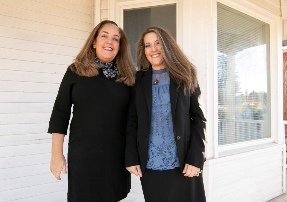 Attorneys Lisa Kirsch Satawa, left, and Theresa Jenkins, shown Thursday, Dec. 2, 2021, outside the soon-to-be office and emergency housing of the Justice Lawyer League in Brighton.