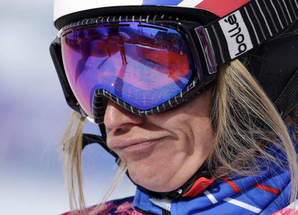 France's Deborah Anthonioz reacts after her seeding run during women's snowboard cross competition at the Rosa Khutor Extreme Park, at the 2014 Winter Olympics, Sunday, Feb. 16, 2014, in Krasnaya Polyana, Russia. (AP Photo/Andy Wong)