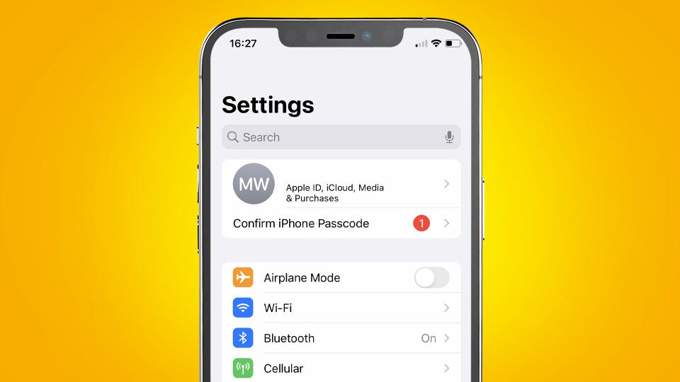 An iPhone on a yellow background showing how to cancel a subscription