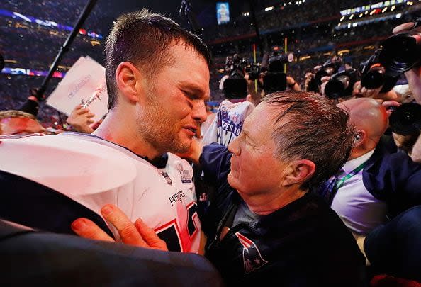 2019:  Tom Brady #12 of the New England Patriots talks to head coach Bill Belichick of the New England Patriots after the Patriots defeat the Rams 13-3 during Super Bowl LIII at Mercedes-Benz Stadium on February 3, 2019 in Atlanta, Georgia.  (Photo by Kevin C. Cox/Getty Images)