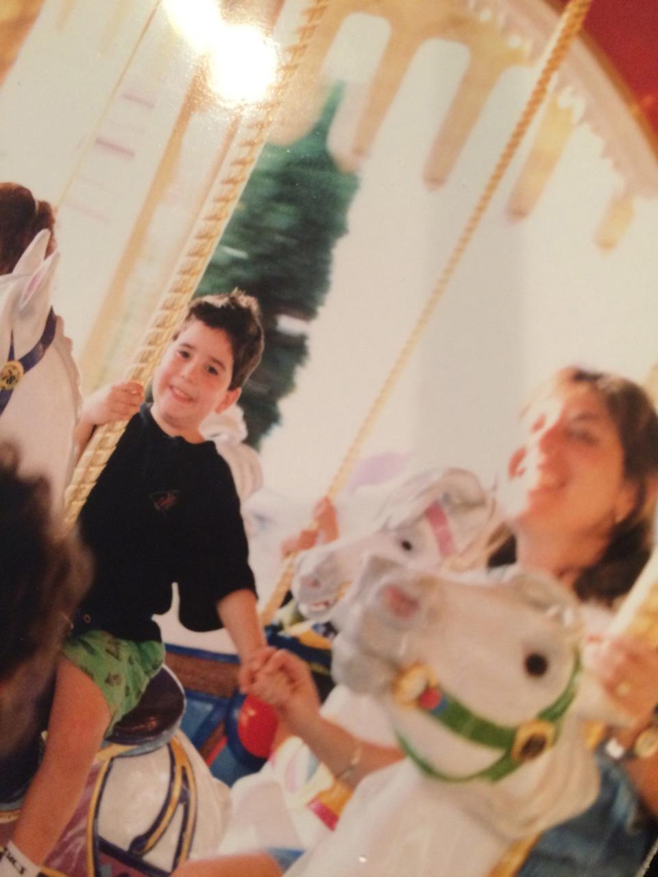 Jordan Horowitz of Manalapan and his mother, Sheryl Horowitz of Freehold, ride the carousel together at Great Adventure in 1994.