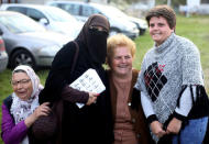 Indira Sinanovic, first Bosnian woman wearing the niqab to run in local election in Bosnia, poses for a photo with supporters during a pre-election rally in Zavidovici, Bosnia and Herzegovina, September 27, 2016. REUTERS/Dado Ruvic