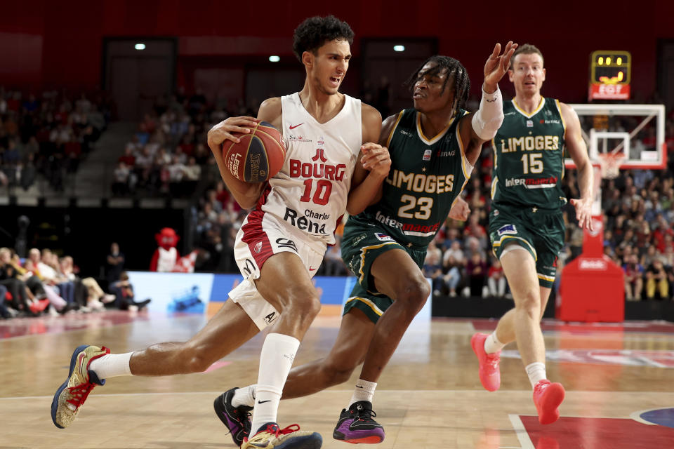 FILE - Zaccharie Risacher, of Bourg-en-Bresse, dribbles during a Betclic Elite basketball game against Limoges in Bourg-en-Bresse, eastern France, Oct. 31, 2023. Risacher is among the headliners of the forwards in the upcoming NBA draft. (AP Photo, File)