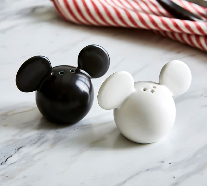 <p><strong>Disney</strong></p><p>Pottery Barn</p><p><strong>$17.99</strong></p><p>Add some whimsy to your dinner table with these cute salt and pepper shakers.</p>