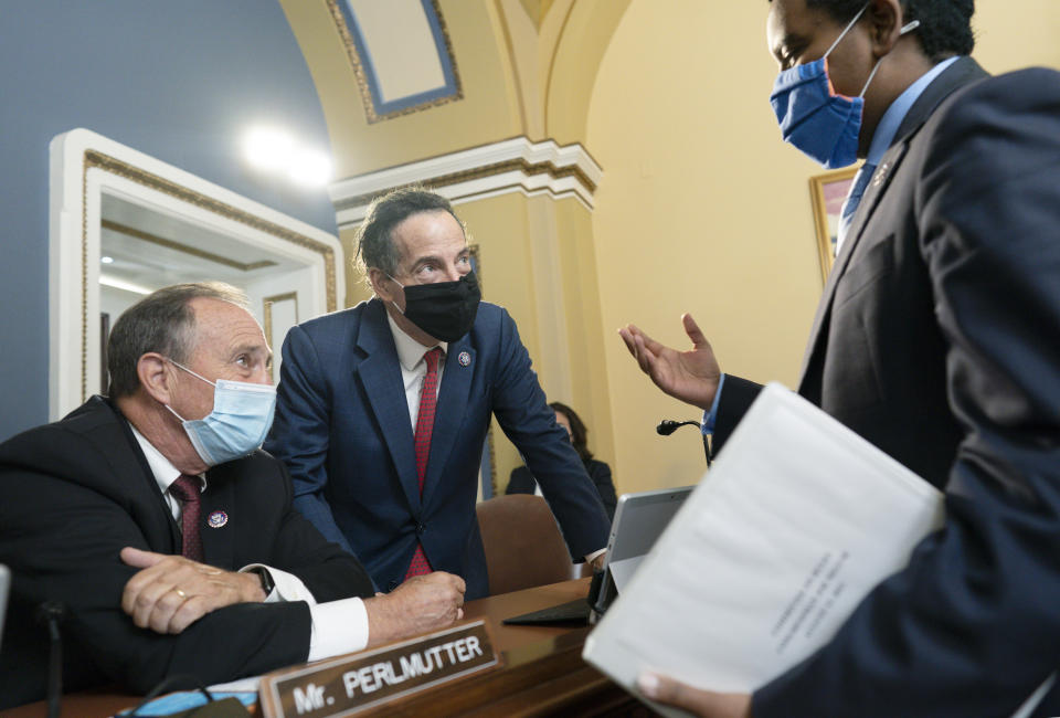 From left, Rep. Ed Perlmutter, D-Colo., Rep. Jamie Raskin, D-Md., and Rep. Joe Neguse, D-Colo., confer after a brief meeting of the House Rules Committee, at the Capitol in Washington, Tuesday, Aug. 24, 2021. (AP Photo/J. Scott Applewhite)