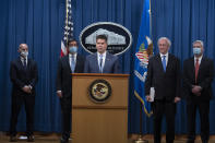 FBI Deputy Director David Bowdich speaks, Wednesday, Sept. 16, 2020 at the Justice Department in Washington. The Justice Department has charged five Chinese citizens with hacks targeting more than 100 companies and institutions in the United States and abroad, including social media and video game companies as well as universities and telecommunications providers. Officials announced the prosecution on Wednesday. (Tasos Katopodis/Pool via AP)