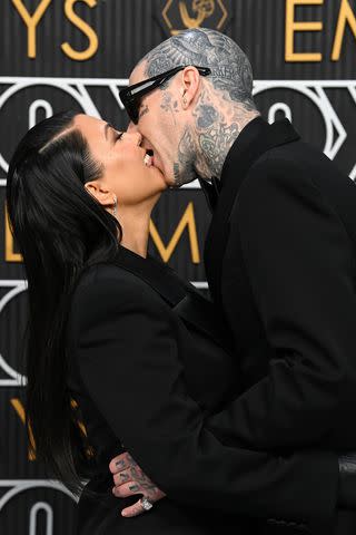 <p>David Fisher/Shutterstock</p> Kourtney Kardashian and Travis Barker