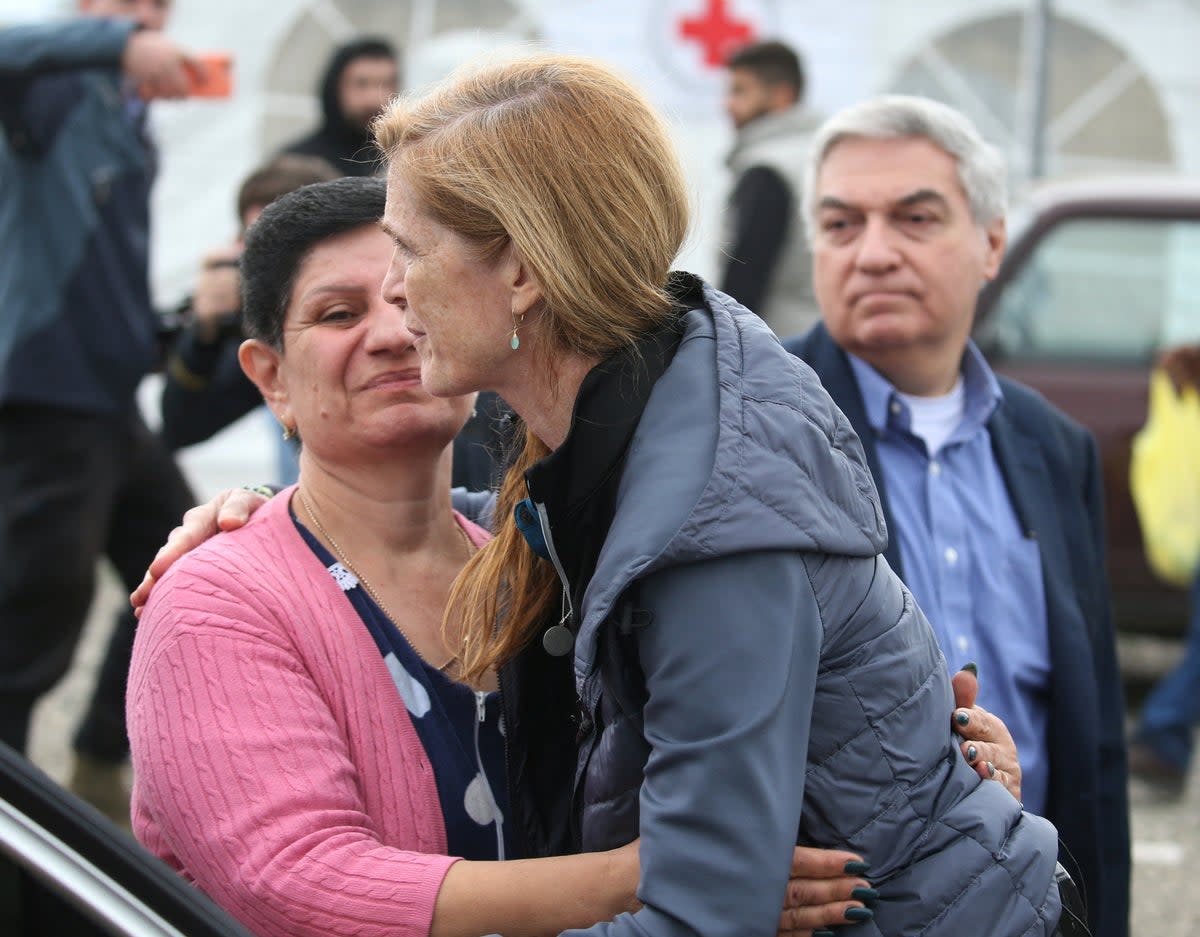 USAID’s Samantha Power hugs refugees at the border village of Kornidzor, Armenia (Reuters)
