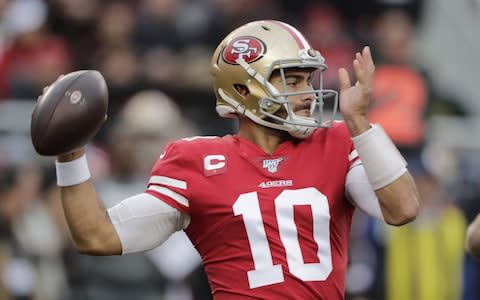 San Francisco 49ers quarterback Jimmy Garoppolo throws against the Green Bay Packers in the first half of their NFC Championship game at Levi's Stadium in Santa Clara, California, USA, 19 January 2020. - Credit: REX