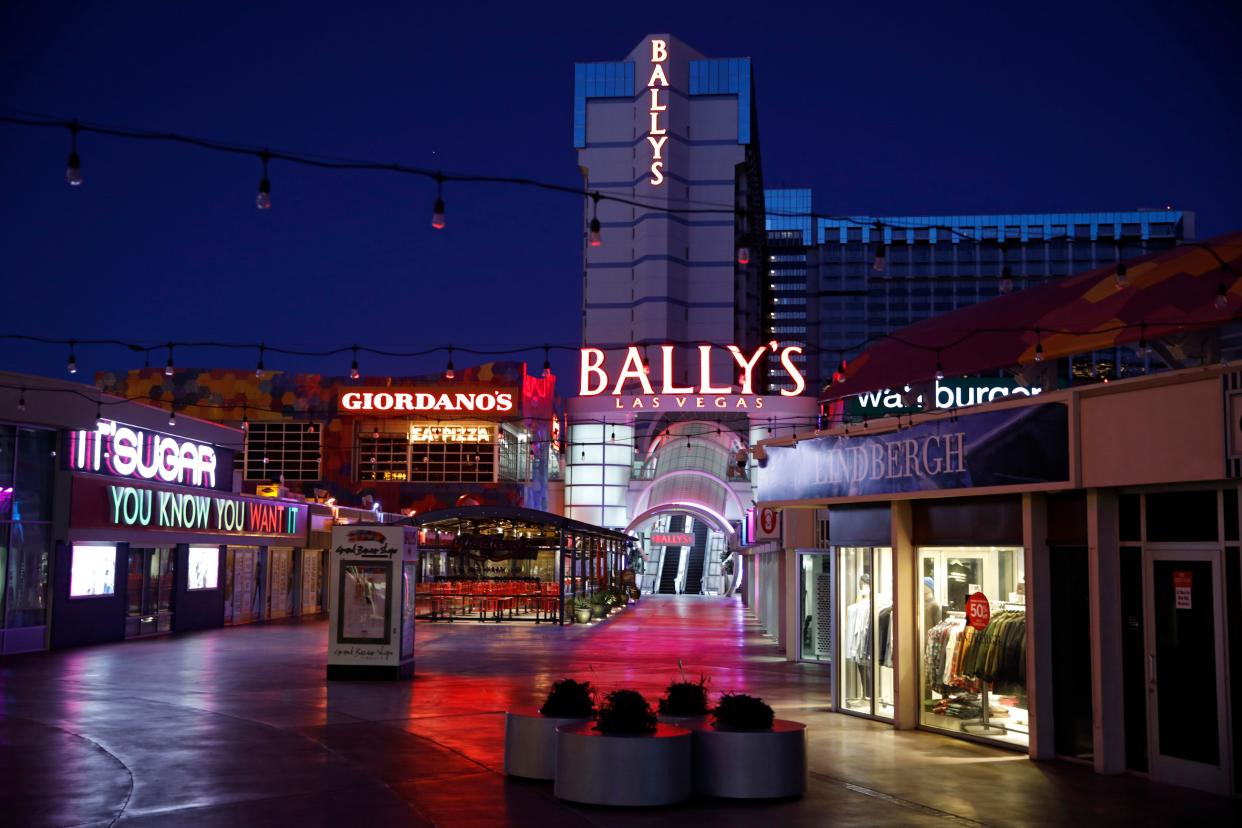 An outdoor mall at Bally's Las Vegas is empty of people along the Las Vegas Strip, during the coronavirus pandemic Tuesday, April 14, 2020, in Las Vegas.