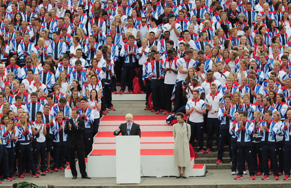 Mayor of London Boris Johnson addresses the athletes and fans from the QVM during the London 2012 Victory Parade for Team GB and Paralympic GB athletes in London, England.