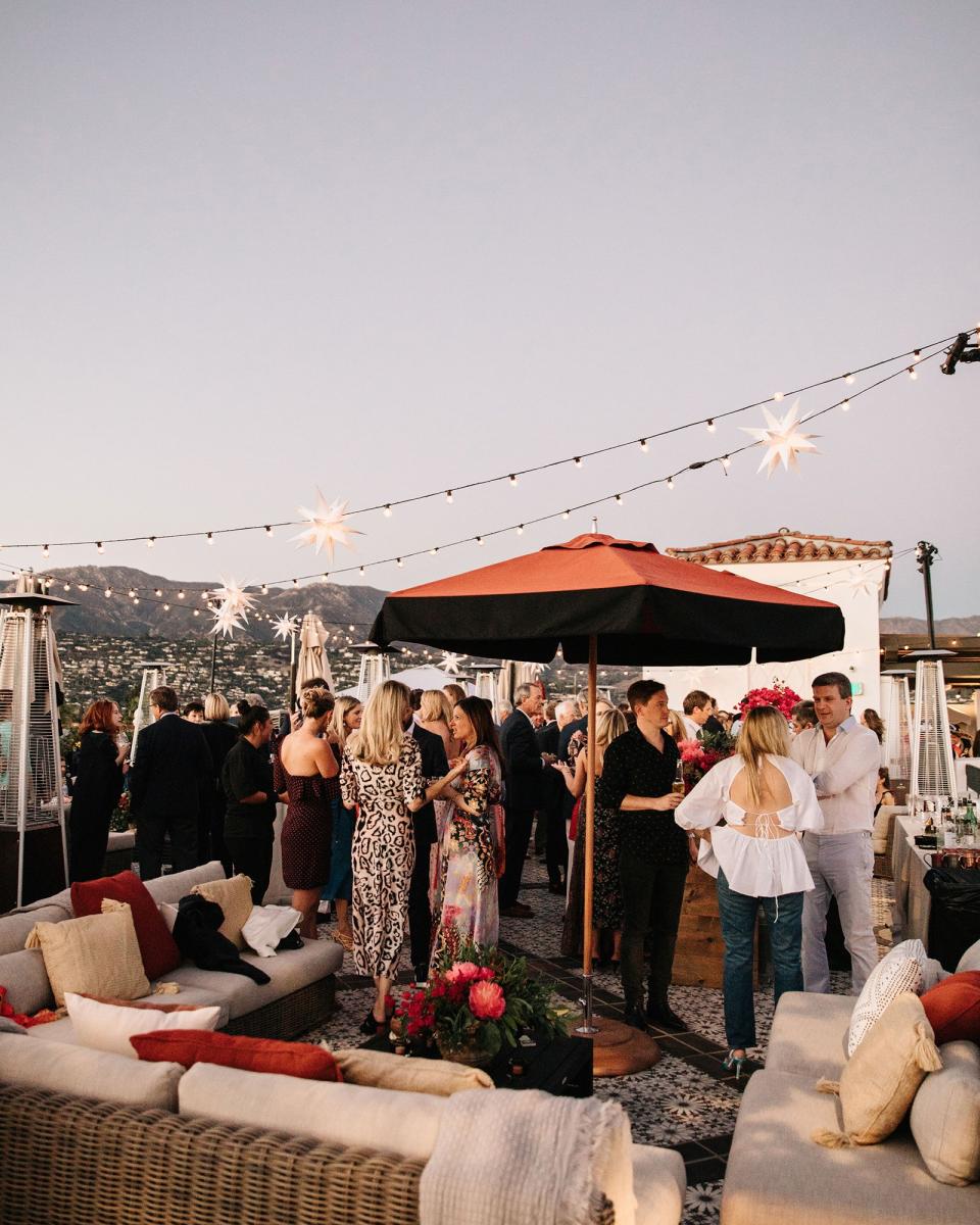 The bride combined California cool with English tradition, wore two Carolina Herrera dresses, and drove off in a vintage Porsche.