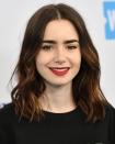 <p>Centre parted with a soft wave, Lily Collins nails the perfect off duty lob.</p>