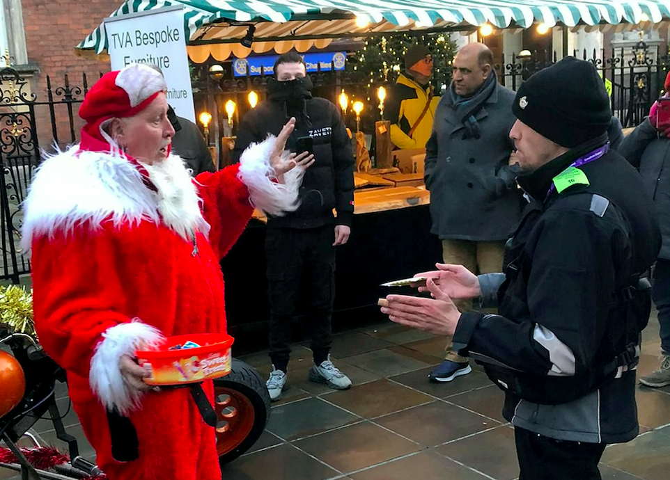 Mick Worrall (left) refused to pay a fine after he dressed as Santa and drove his sleigh in Worcester city centre. (SWNS)