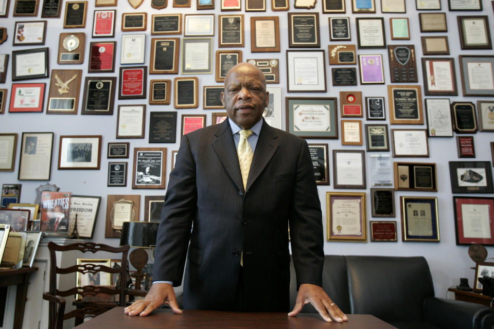 CORRECTS POLITICAL PARTY FROM REPUBLICAN TO DEMOCRAT - FILE - In this Thursday, May 10, 2007 file photo, U.S. Rep. John Lewis, D-Ga., in his office on Capitol Hill, in Washington. Lewis, who carried the struggle against racial discrimination from Southern battlegrounds of the 1960s to the halls of Congress, died Friday, July 17, 2020. (AP Photo/Susan Walsh, File)